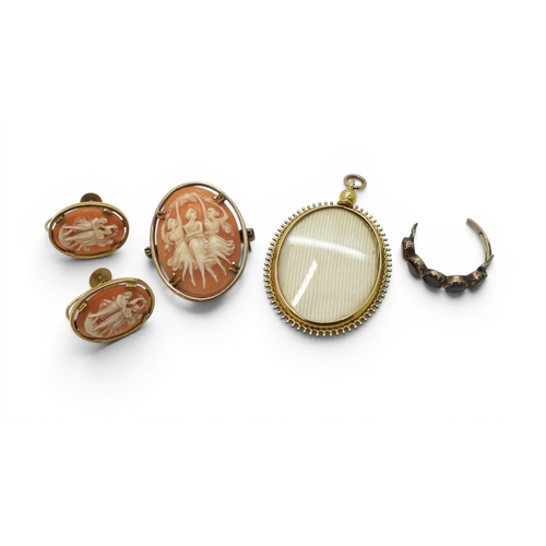 754 - A 9ct gold double sided glass locket, together with a pair of 9ct gold cased cameo earrings, and a p... 