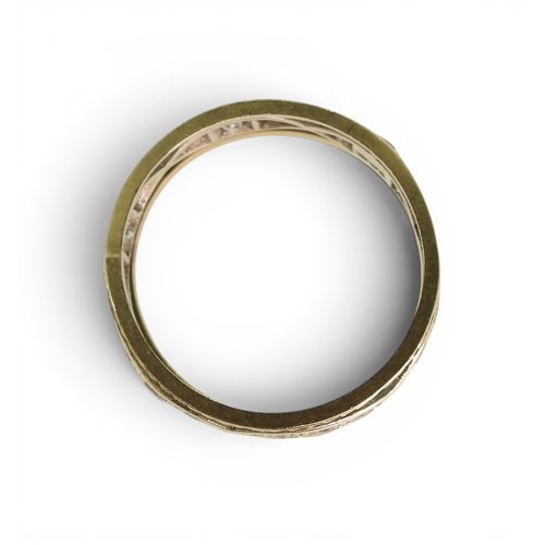 757 - A 9ct gold clear gem set eternity ring, size M, weight 2.8gms