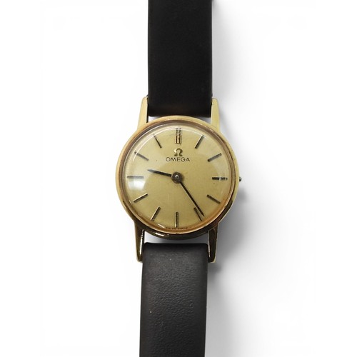 726 - A 9ct gold Omega ladies watch, weight including strap and mechanism 10.7gms