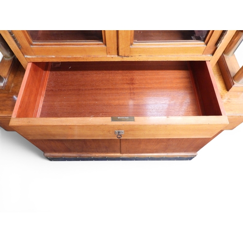 2010A - AN IMPRESSIVE EARLY 20TH CENTURY CONTINENTAL BLONDE OAK ARTS & CRAFTS DISPLAY CABINETsurmounted ... 