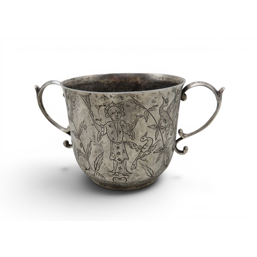 910 - A silver porringer, by William Comyns, London 1934, decorated with Chinoserie scenes, 170gms