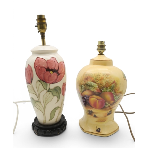 366 - A Moorcroft tulip pattern table lamp together with an Aynsley Orchard Gold table lamp