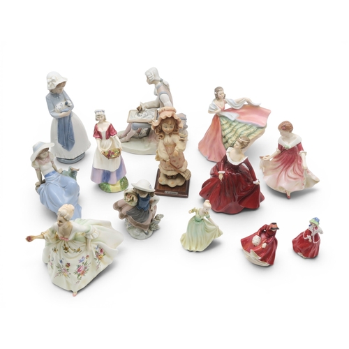 368 - A group of Royal Doulton figures including Dawn, Nao figures and other figures