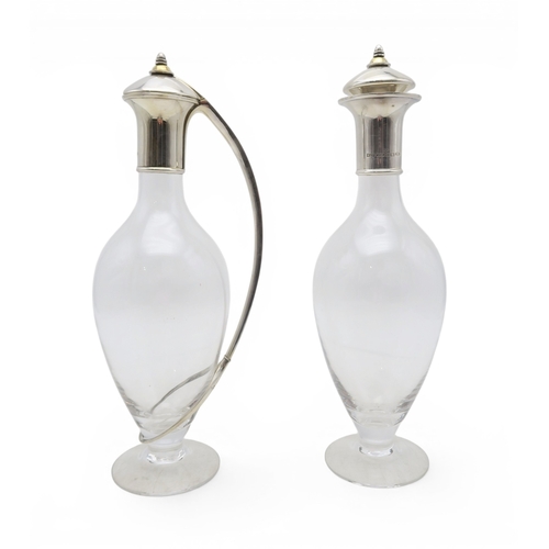 2400 - MARTIN PUGH FOR MAPPIN & WEBB;A silver glass decanter and claret jug, Birmingham 2000, Millenium... 