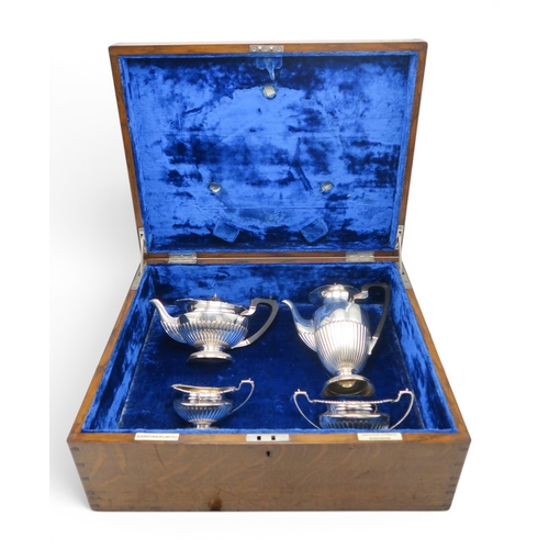 2405 - ELKINGTON & CO;A late-Victorian four piece silver tea service, Birmingham 1895, in the Queen Ann... 