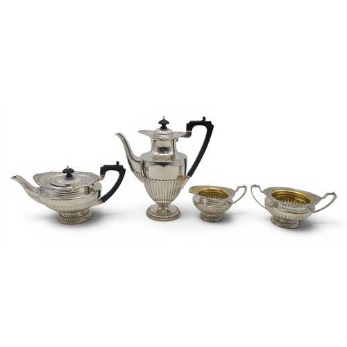 2405 - ELKINGTON & CO;A late-Victorian four piece silver tea service, Birmingham 1895, in the Queen Ann... 