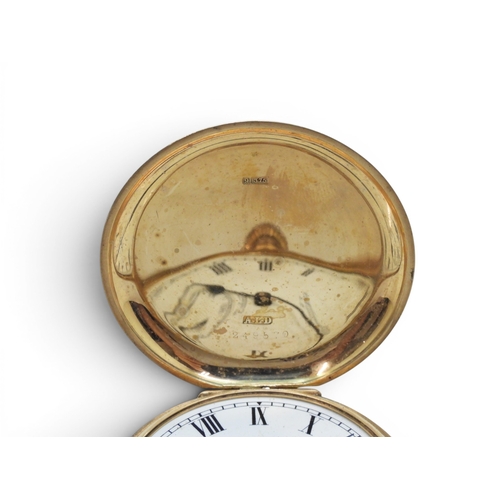 703 - A 9ct gold Waltham full hunter pocket watch, (glass missing) diameter 5cm, both back and front and i... 
