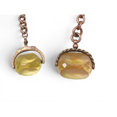 706 - A 9ct gold citrine fob seal with a short length a 9ct gold chain with a 'T' bar, together with a gla... 