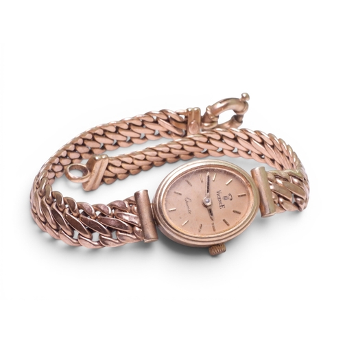 709 - A 9ct gold ladies Vicence quartz watch with integral strap, full UK hallmarks, length of strap 21.5c... 
