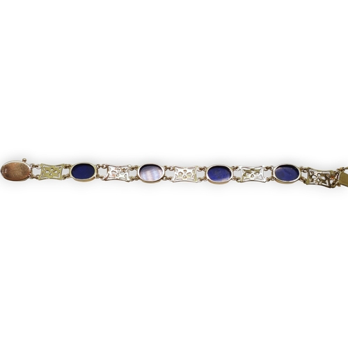722 - A 9ct gold lapis lazuli set bracelet, length 18cm, weight 16.5gms