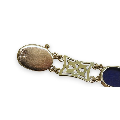 722 - A 9ct gold lapis lazuli set bracelet, length 18cm, weight 16.5gms