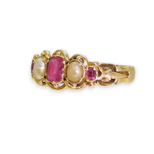 725 - A yellow metal ruby and pearl set ring, size L1/2, weight 1.8gms