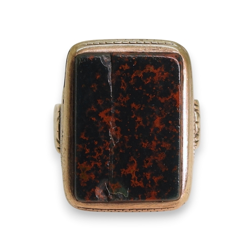 741 - A yellow metal bloodstone signet ring, size K, (af) weight 6.8gms