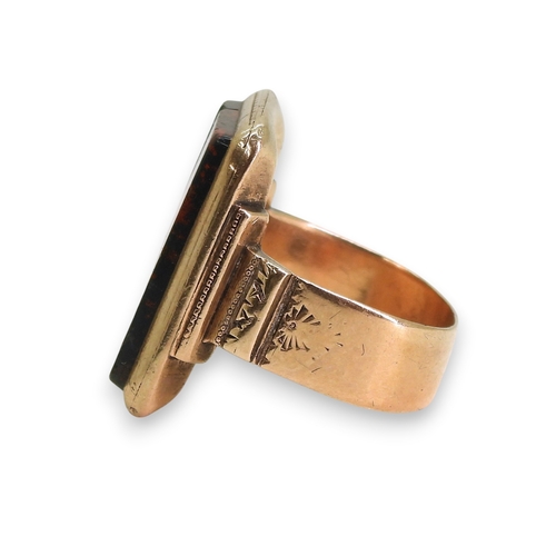 741 - A yellow metal bloodstone signet ring, size K, (af) weight 6.8gms