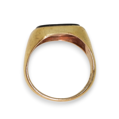 742 - A 9ct gold onyx signet ring, size R1/2, weight 8.2gms