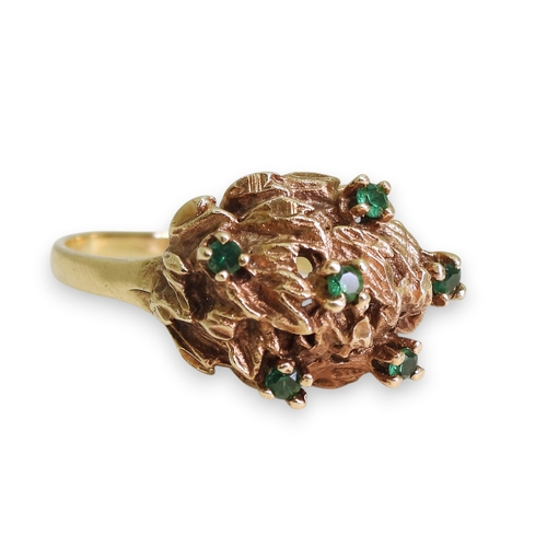 747 - A 10k gold green gem set retro ring, size R1/2, weight 5.2gms