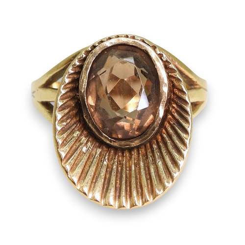 750 - A 9ct gold retro sunburst ring set with a smoky quartz, size R1/2, weight 5.2gms