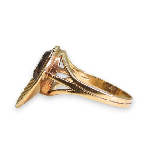 750 - A 9ct gold retro sunburst ring set with a smoky quartz, size R1/2, weight 5.2gms