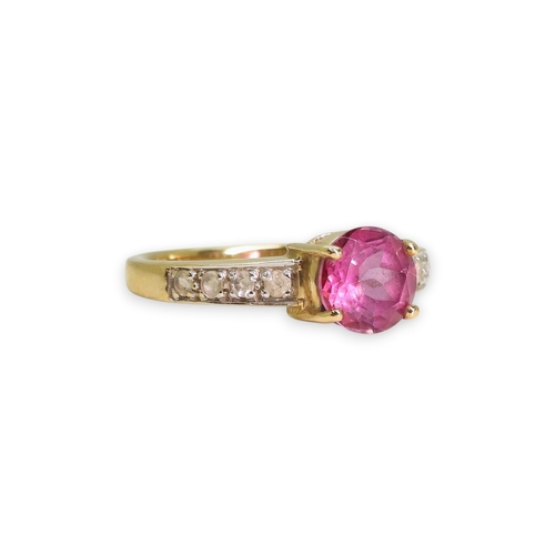 754 - A 9ct gold flamingo topaz and clear gem set ring, size N1/2, weight 3gms