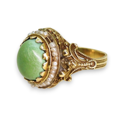 755 - A yellow metal ring set with seed pearls and turquoise, indistinctly stamped 14, size L1/2, weight 4... 