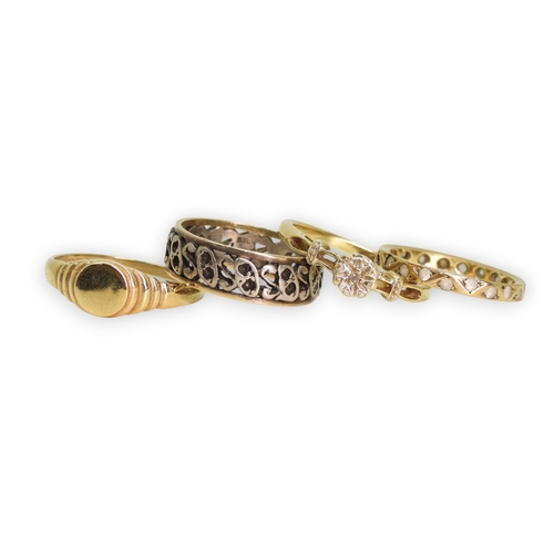 757 - A 9ct signet ring, size O1/2, a yellow metal clear gem set eternity ring, size J1/2, a 9ct gold diam... 