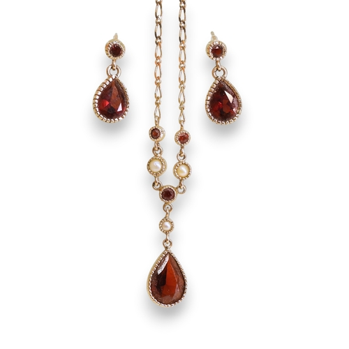 759 - A 9ct gold garnet and pearl necklace. length 41cm, with a pair of matching earrings, weight combined... 