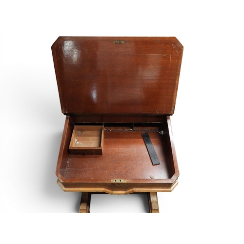 10 - A late 19th century oak Davenport writing desk with hinged top stationary compartment over skiver to... 