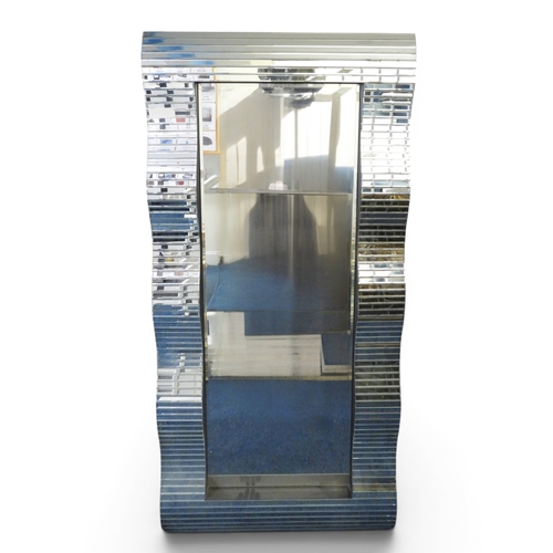 25 - A large modernist wall mirror with serpentine mirror clad frame, 200cm x 92cm
