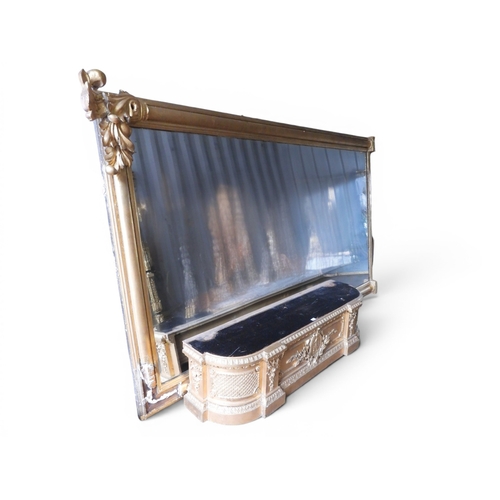 30 - An exceedingly large 19th century giltwood framed wall mirror with moulded column frame capped with ... 