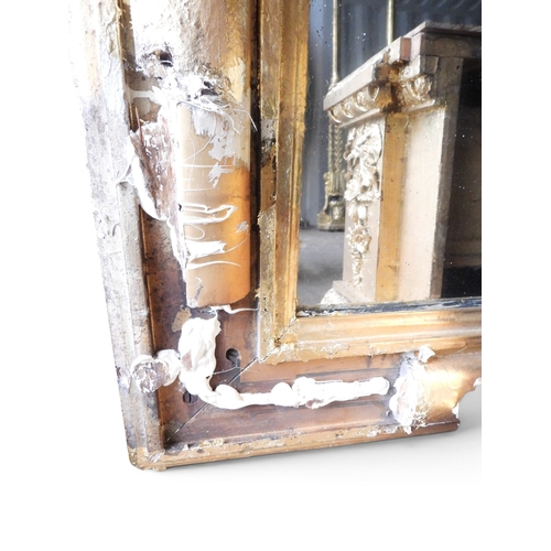 30 - An exceedingly large 19th century giltwood framed wall mirror with moulded column frame capped with ... 
