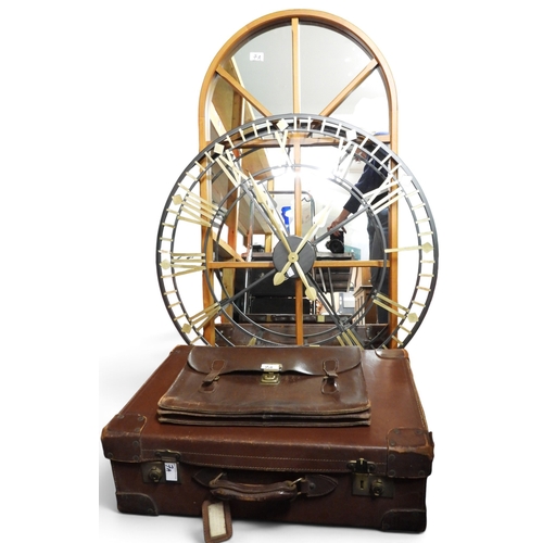 7A - A contemporary wall mirror, a wall clock, a leather briefcase and a suitcase