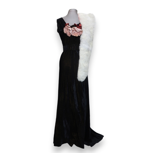 8007 - A 1930s black nacré velvet evening gown with applied velvet flower corsage by Reville London; togeth... 