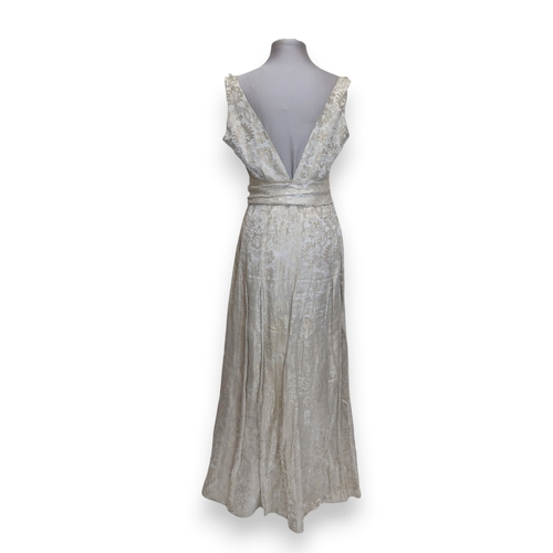 8004 - A 1950s/60s champagne damask evening gown with detachable cape train and matching belt with rhinesto... 