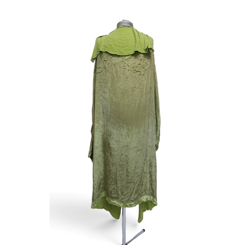 8005 - A circa 1930s pink silk velvet cape with white fox fur collar, lined with champagne satin; a blue si... 