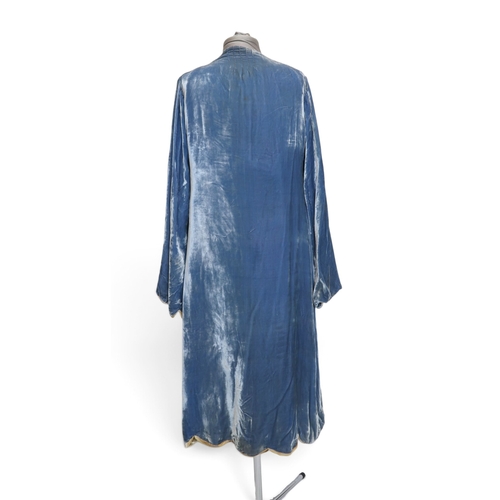 8005 - A circa 1930s pink silk velvet cape with white fox fur collar, lined with champagne satin; a blue si... 
