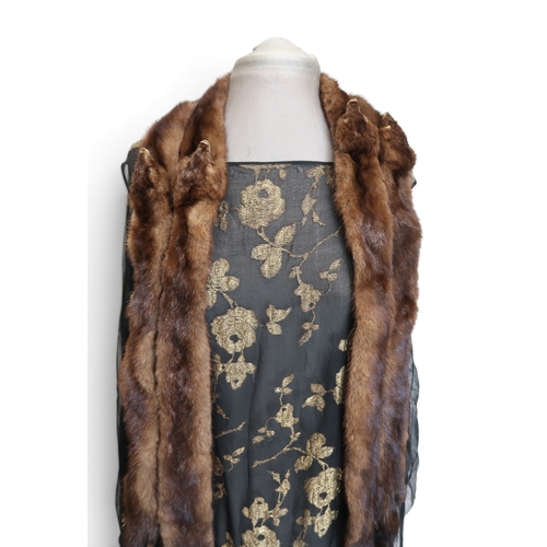 8006 - A 1920s black chiffon evening dress woven with metallic threads in floral design, with chiffon hangi... 