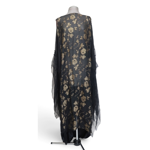 8006 - A 1920s black chiffon evening dress woven with metallic threads in floral design, with chiffon hangi... 