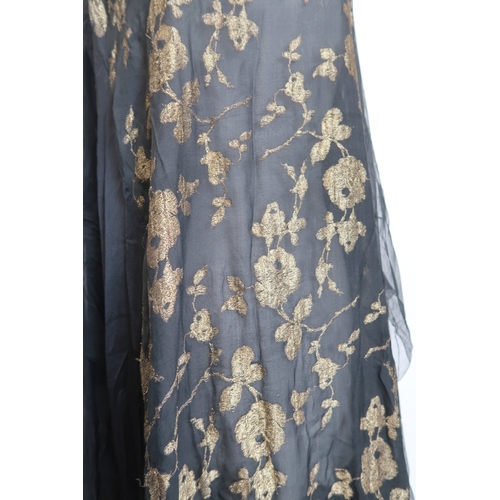 8006 - A 1920s black chiffon evening dress woven with metallic threads in floral design, with chiffon hangi... 