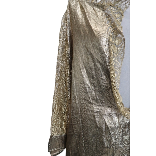 8006 - A 1920s black chiffon evening dress woven with metallic threads in floral design, with chiffon hangi... 