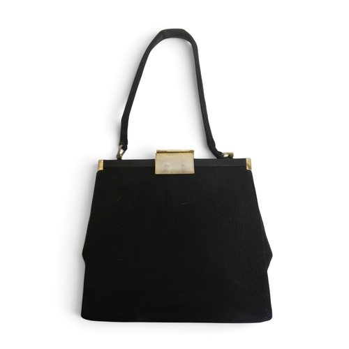 8008 - An Astrakhan Persian lamb double breasted jacket by Worth London, a crocodile handbag and a black co... 