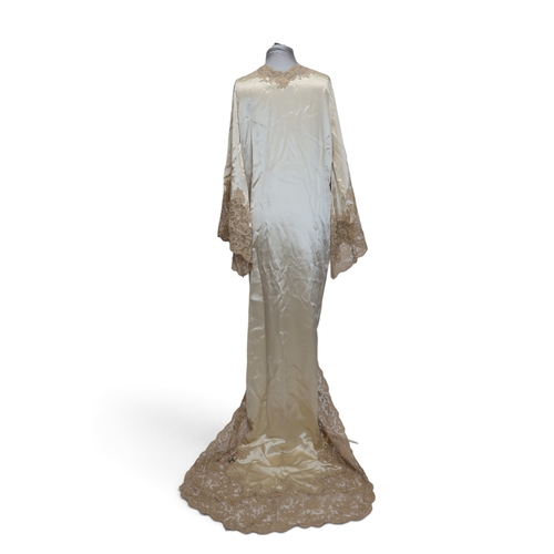 8016 - A vintage Saks Fifth Avenue champagne satin peignoir with silk flower detail, a matching set of lace... 