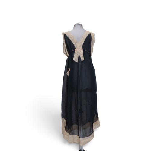 8016 - A vintage Saks Fifth Avenue champagne satin peignoir with silk flower detail, a matching set of lace... 