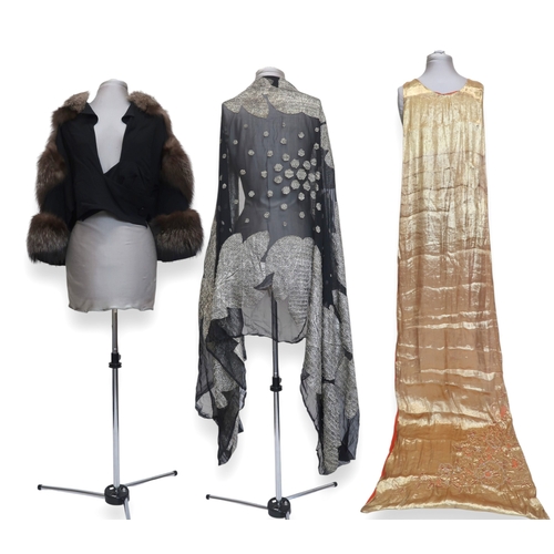 8020 - *Amended* A 1920s fur trimmed black cape by Reville London, a black shawl with silver lamé leaf-patt... 