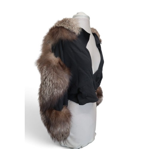 8020 - *Amended* A 1920s fur trimmed black cape by Reville London, a black shawl with silver lamé leaf-patt... 