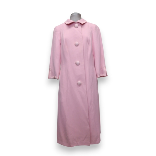 8012 - 1950's and 60's ladieswear comprising a black moiré full-length double breasted cape, a coordinated ... 