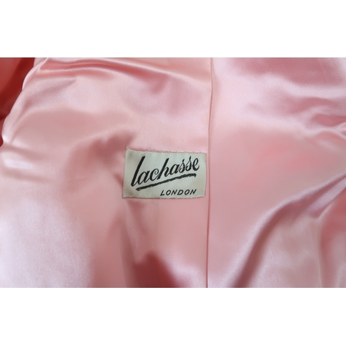 8012 - 1950's and 60's ladieswear comprising a black moiré full-length double breasted cape, a coordinated ... 