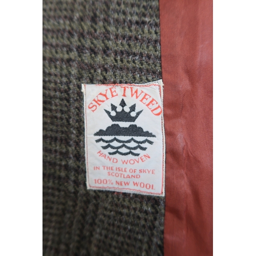 8021 - A black tailcoat by Henry Poole & Co. Saville Row and a Rodex Skye Tweed coat (2)black tailcoat:... 