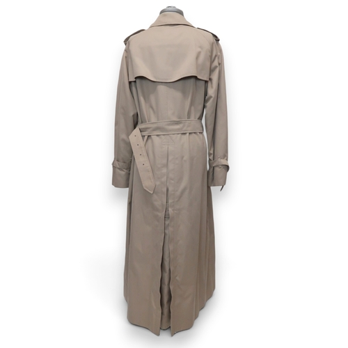 8030 - A vintage Burberry trench coat with belt, lined in nova check pattern