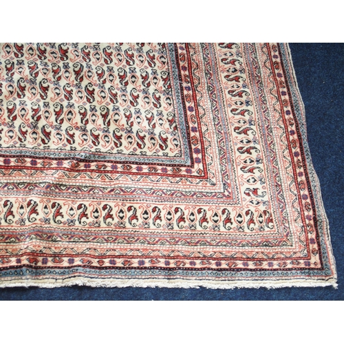 2086 - A LARGE CREAM GROUND DEEP PILE MAHAL RUGwith all-over multicoloured geometric patterned ground withi... 