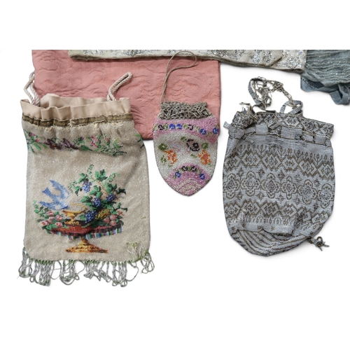 8022 - A collection of bags including beadwork reticules; leather and suede gloves, a sequin embroidered tu... 